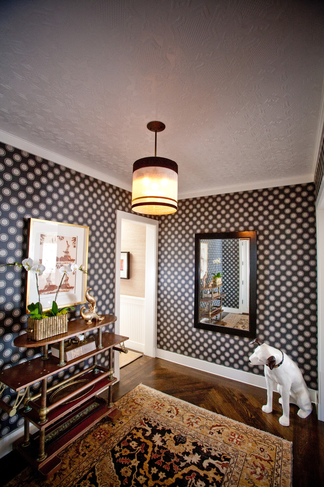 Eclectic dark wood floor hallway photo in San Diego