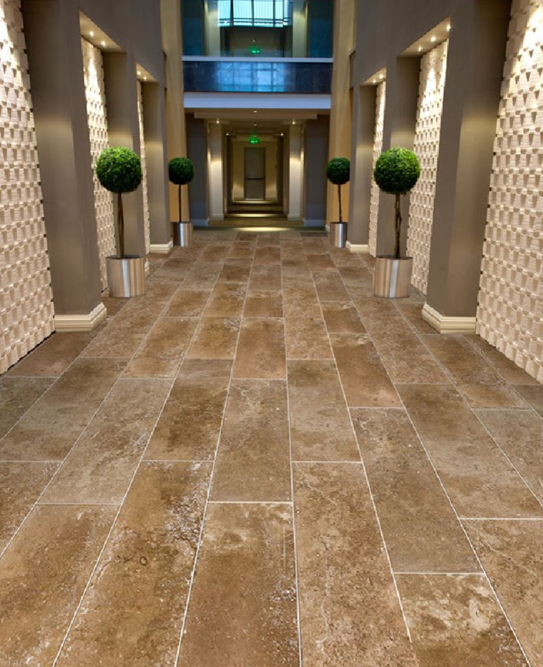 Large format 12" x 26" Coco Travertine Tiles from Royal Stone & Tile Contemporary Hall Los