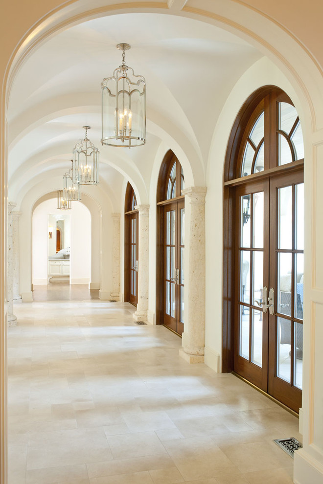 Inspiration for a timeless hallway remodel in Dallas with white walls