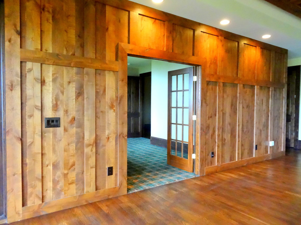 Hallway - huge rustic medium tone wood floor hallway idea in Charlotte with white walls