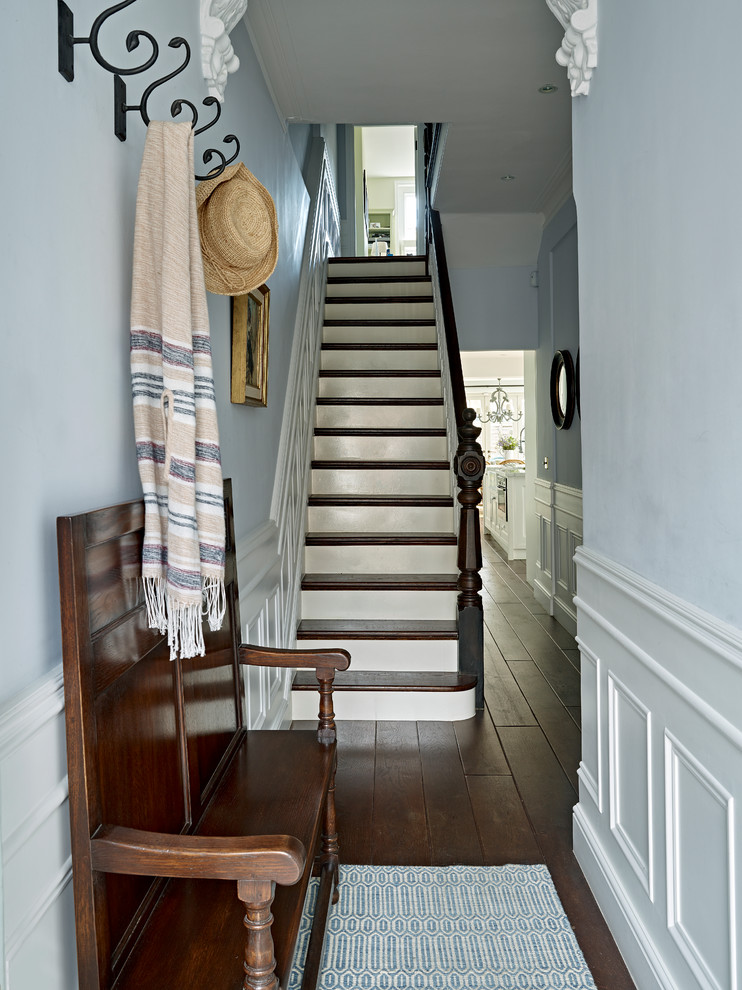 Example of a mid-sized transitional hallway design in London