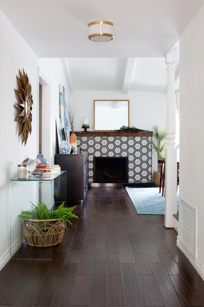 Example of a mid-sized 1960s dark wood floor hallway design in Los Angeles with white walls