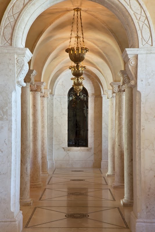 Inspiration for a mediterranean marble floor hallway remodel in Miami
