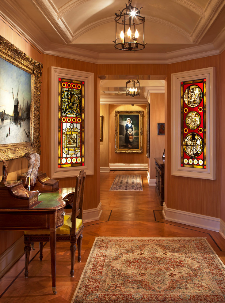 Hallway - mediterranean medium tone wood floor hallway idea in Milwaukee