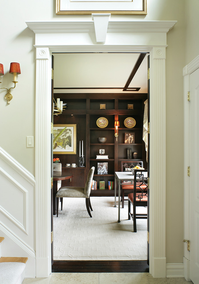Example of a mid-sized eclectic limestone floor hallway design in New York with beige walls