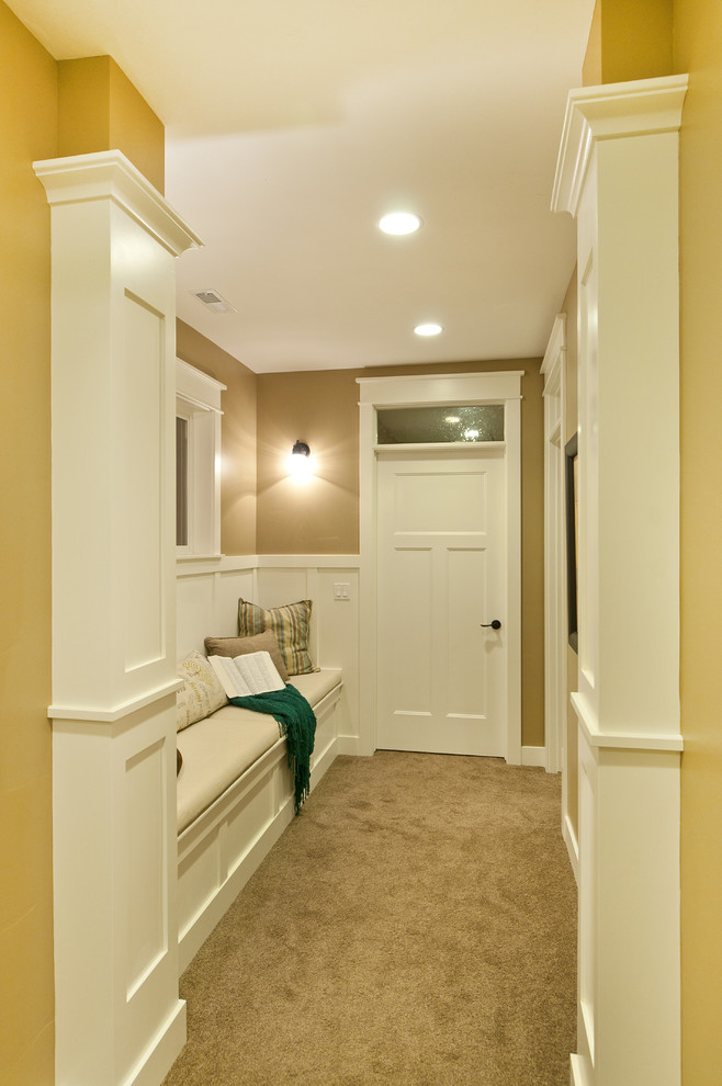 Inspiration for a large craftsman carpeted hallway remodel in Salt Lake City with beige walls