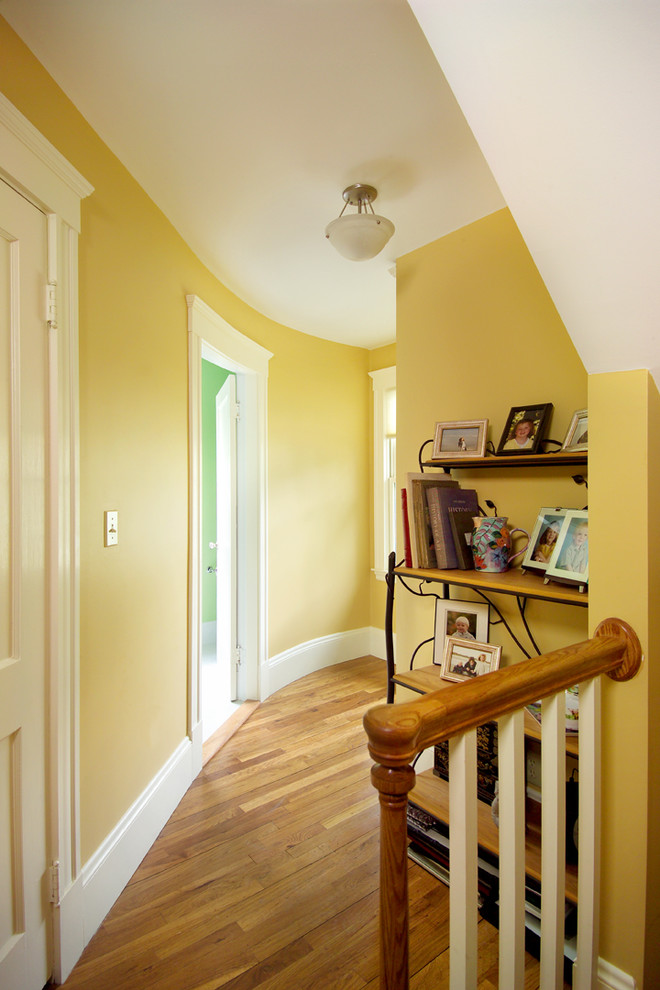 Example of an eclectic hallway design in Boston
