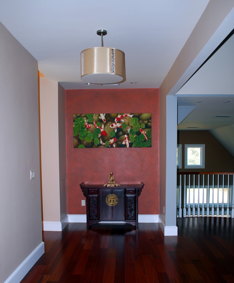 Inspiration for a large timeless dark wood floor hallway remodel in Boston with multicolored walls