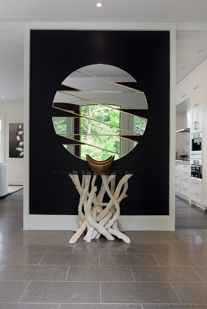 Hallway - contemporary hallway idea in Toronto with black walls