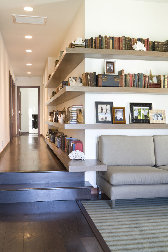 Inspiration for a contemporary dark wood floor hallway remodel in Los Angeles with white walls