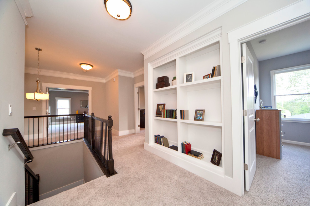 Example of a large transitional carpeted hallway design in Atlanta with gray walls