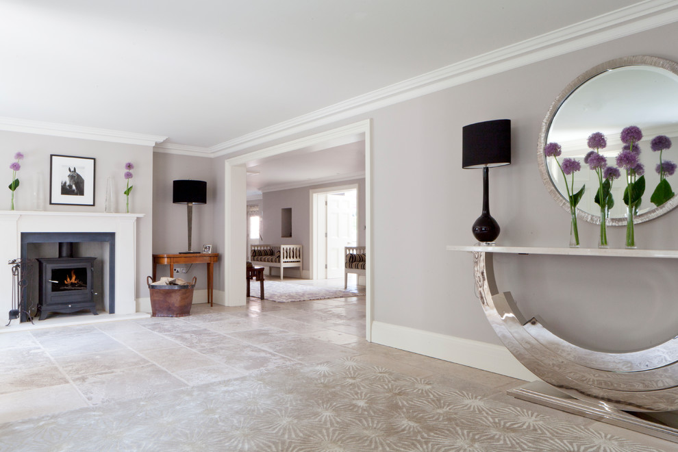 Example of a large classic limestone floor and gray floor hallway design in Oxfordshire with gray walls