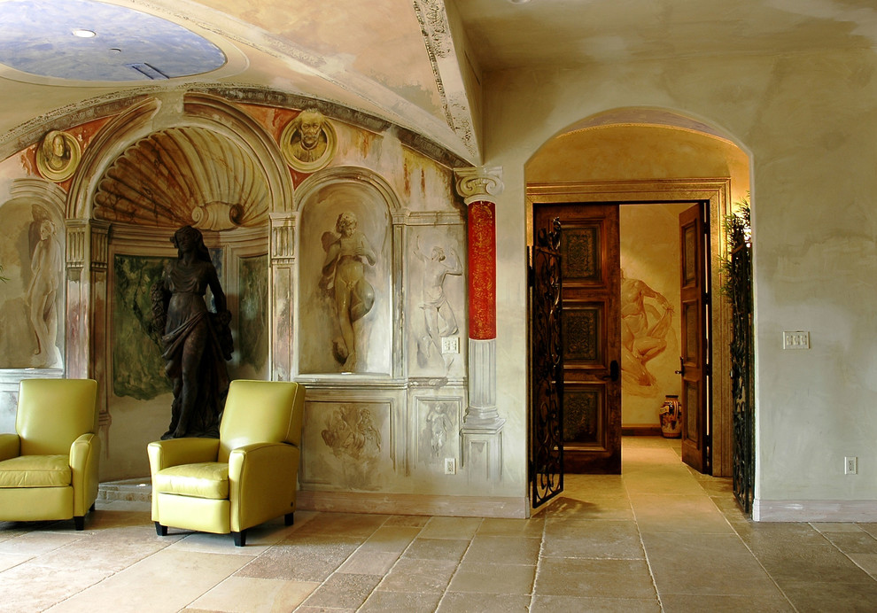 Foto de recibidores y pasillos mediterráneos extra grandes con suelo de piedra caliza, suelo beige y paredes multicolor