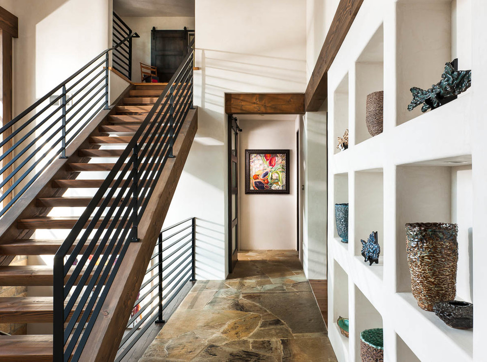 Example of a large mountain style hallway design in Other