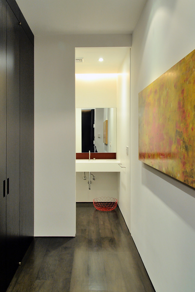 Inspiration for a contemporary hallway remodel in New York with white walls