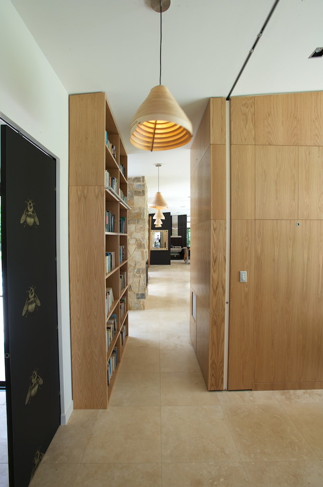 Hallway - mid-sized contemporary travertine floor hallway idea in Gold Coast - Tweed with white walls