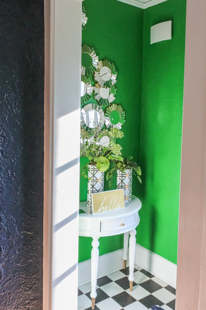 На фото: маленький коридор в стиле неоклассика (современная классика) с зелеными стенами и разноцветным полом для на участке и в саду