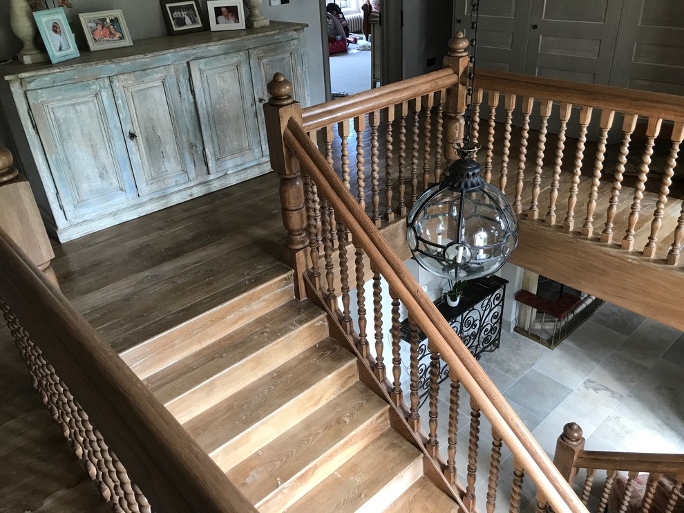Photo of a medium sized classic staircase in Other.