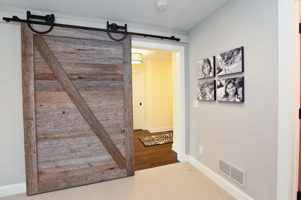 Hallway - rustic carpeted hallway idea in Minneapolis with gray walls
