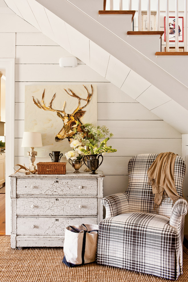 Cottage chic hallway photo in Atlanta with white walls