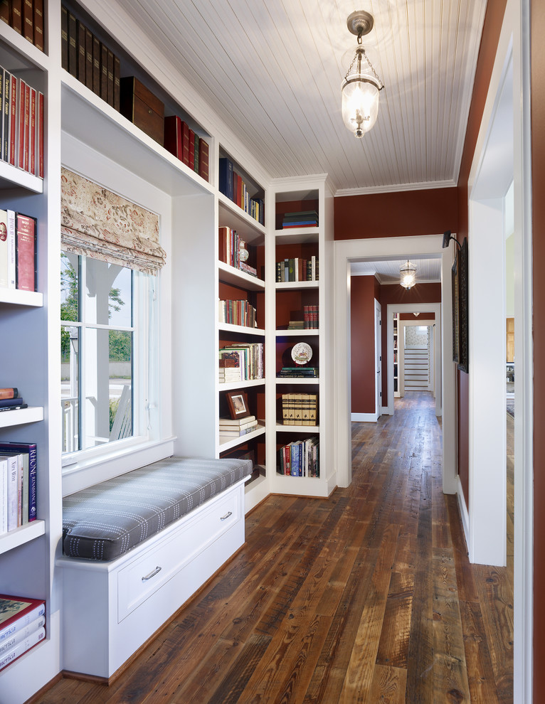 Hallway - cottage dark wood floor hallway idea in DC Metro with red walls