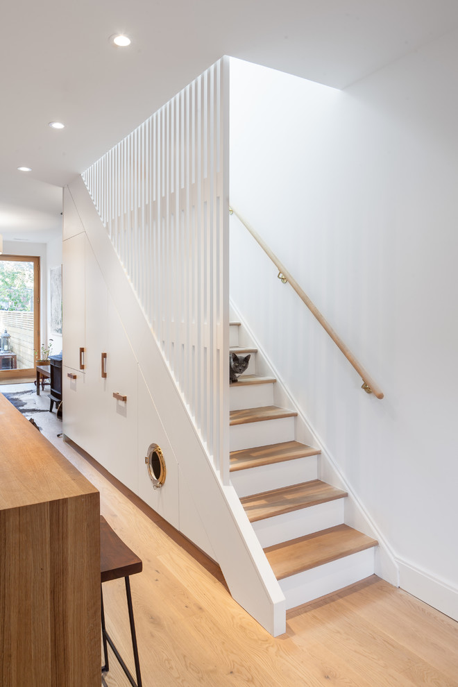 Staircase - mid-sized modern staircase idea in Toronto