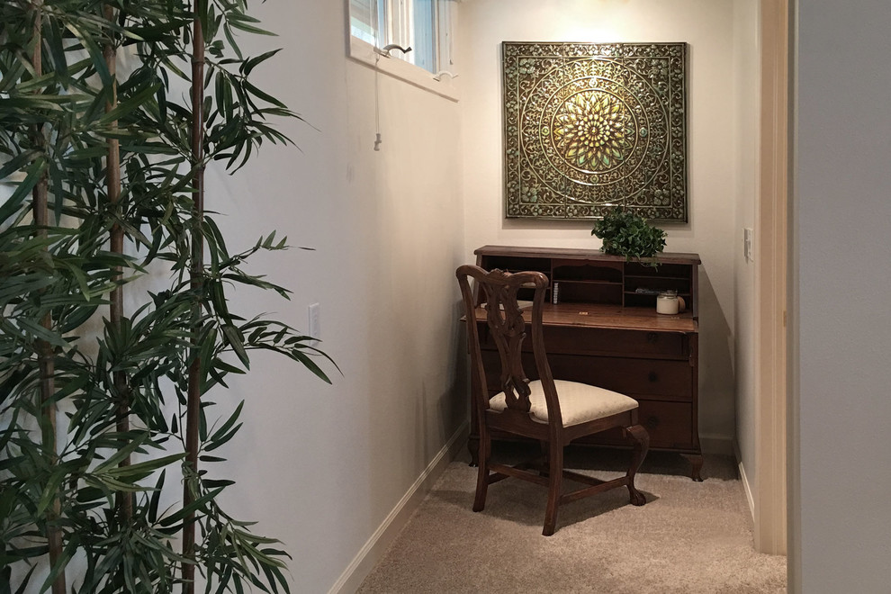 Example of a small classic carpeted and beige floor hallway design in Tampa with white walls