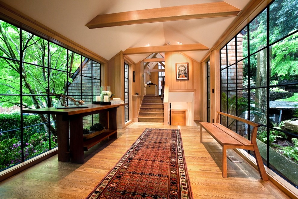 Inspiration for a contemporary medium tone wood floor hallway remodel in San Francisco