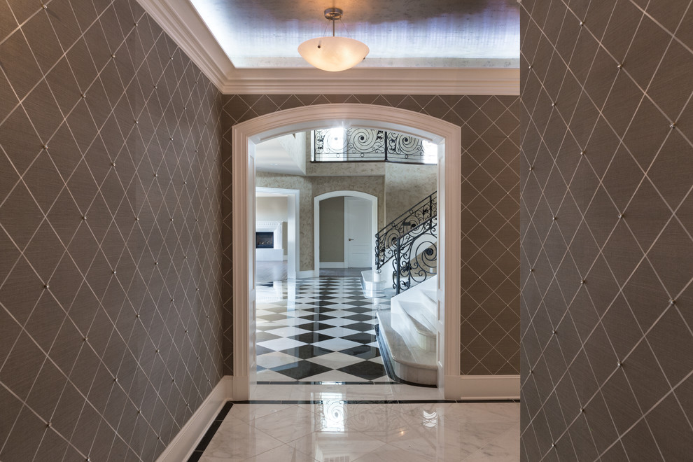 Example of a large trendy marble floor hallway design in San Francisco with gray walls