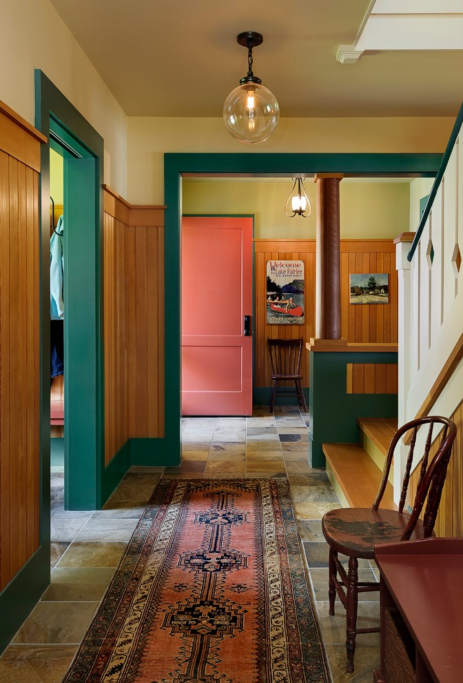 Mountain style slate floor and multicolored floor hallway photo in Burlington with beige walls