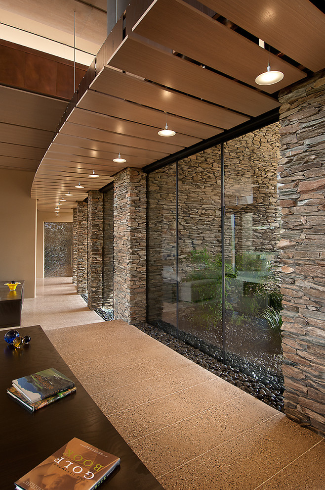 Hallway - large southwestern hallway idea in Phoenix