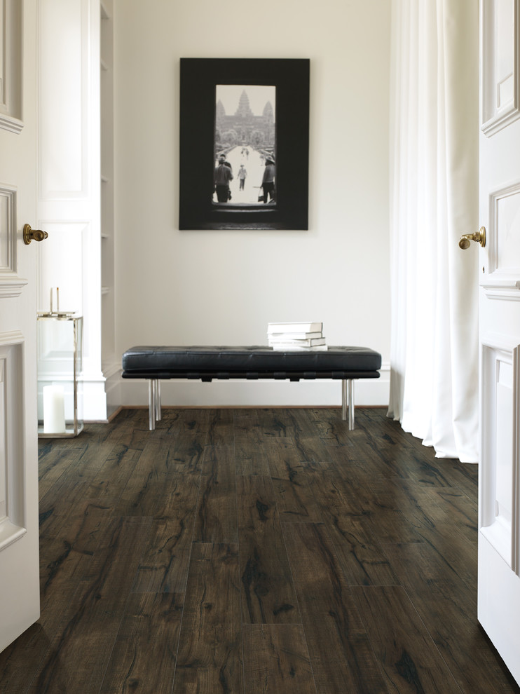 Inspiration for a mid-sized transitional dark wood floor and brown floor hallway remodel in Orange County with white walls