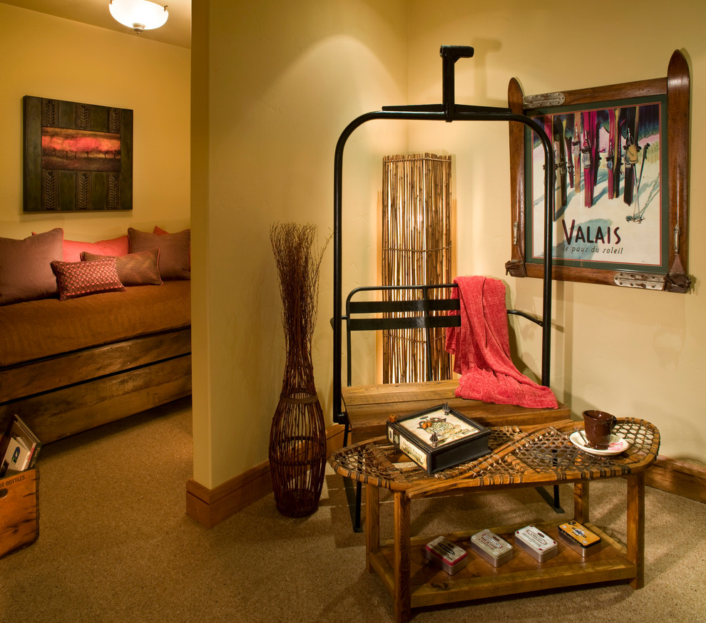 Example of a mid-sized mountain style carpeted and beige floor hallway design in Other with beige walls