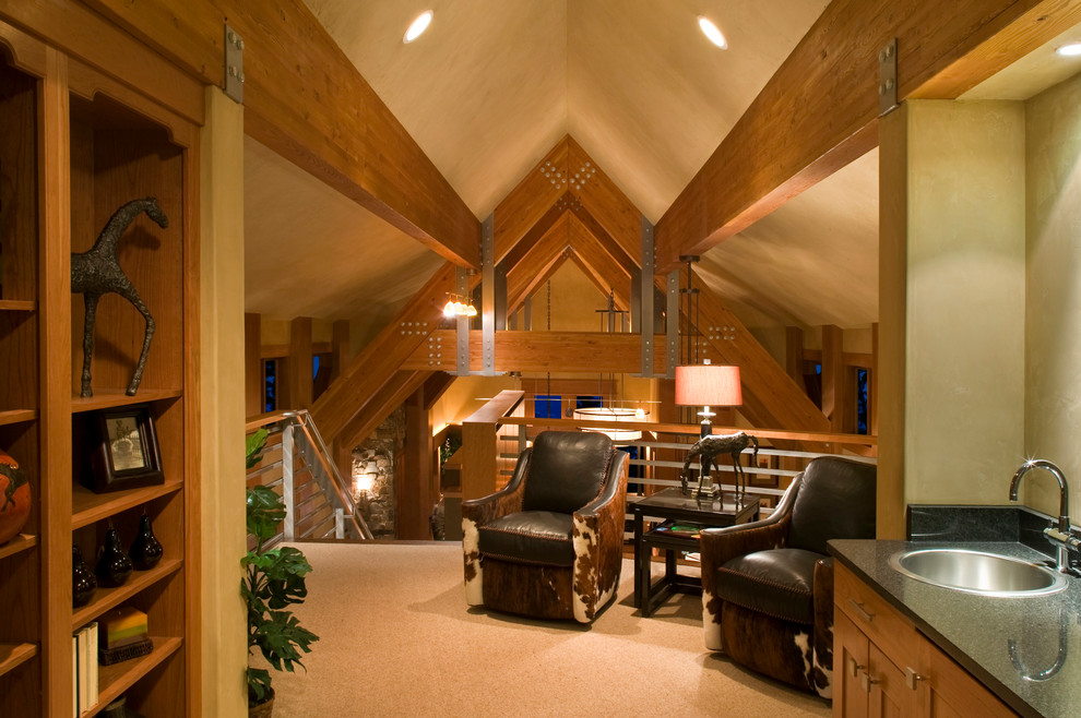 Example of a mid-sized mountain style carpeted and beige floor hallway design in Other with beige walls