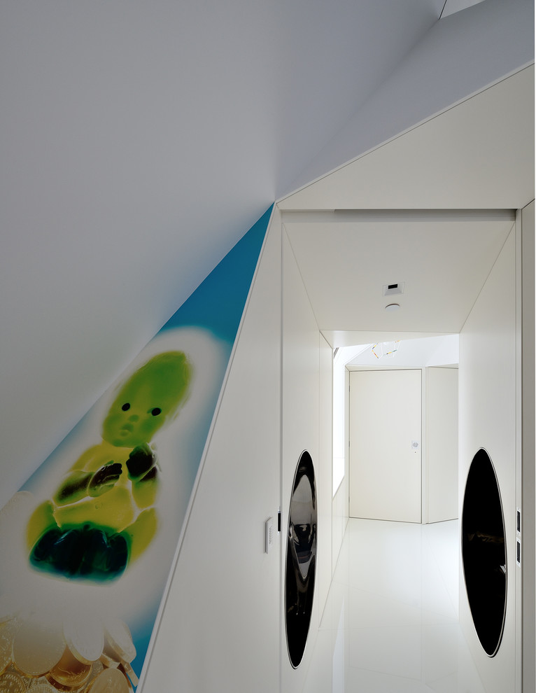 Hallway - contemporary hallway idea in New York with white walls