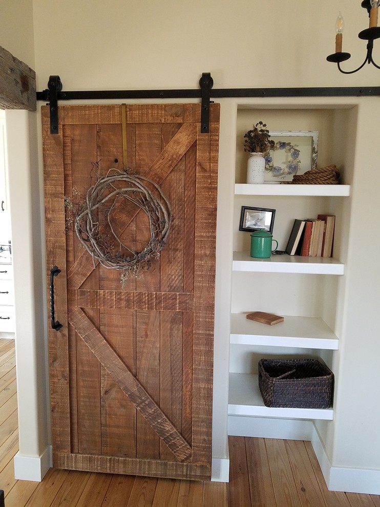 Sliding barn door - Rustic - Hall - Grand Rapids - by R-Value Homes | Houzz