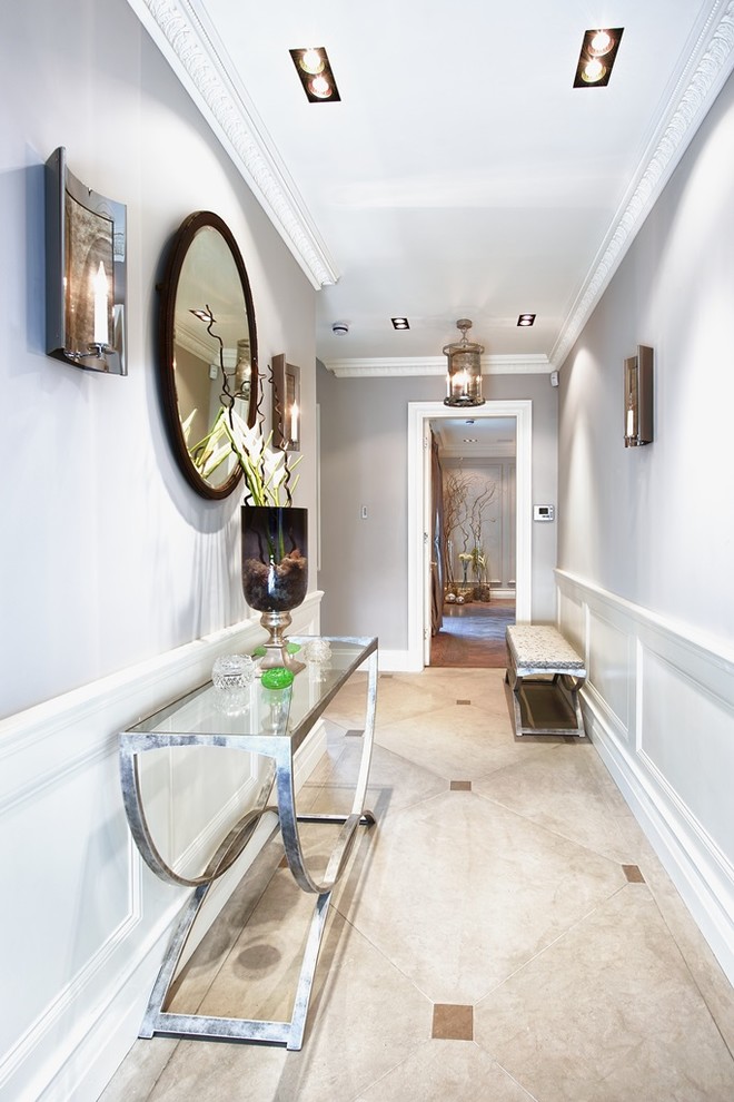 Example of a trendy hallway design in London with gray walls