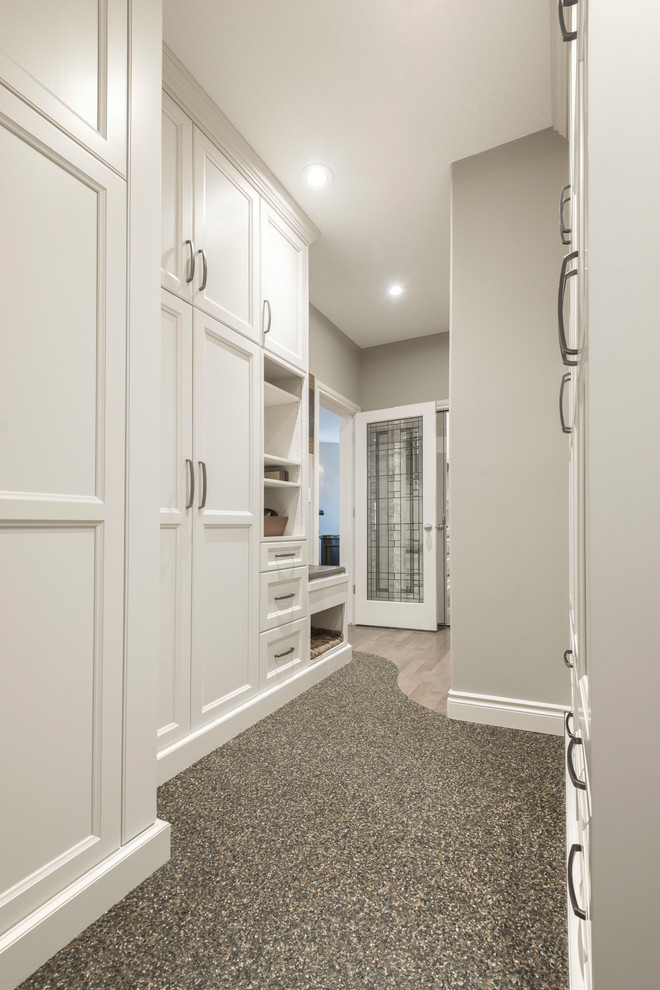 Mid-sized transitional cork floor hallway photo in Edmonton with gray walls