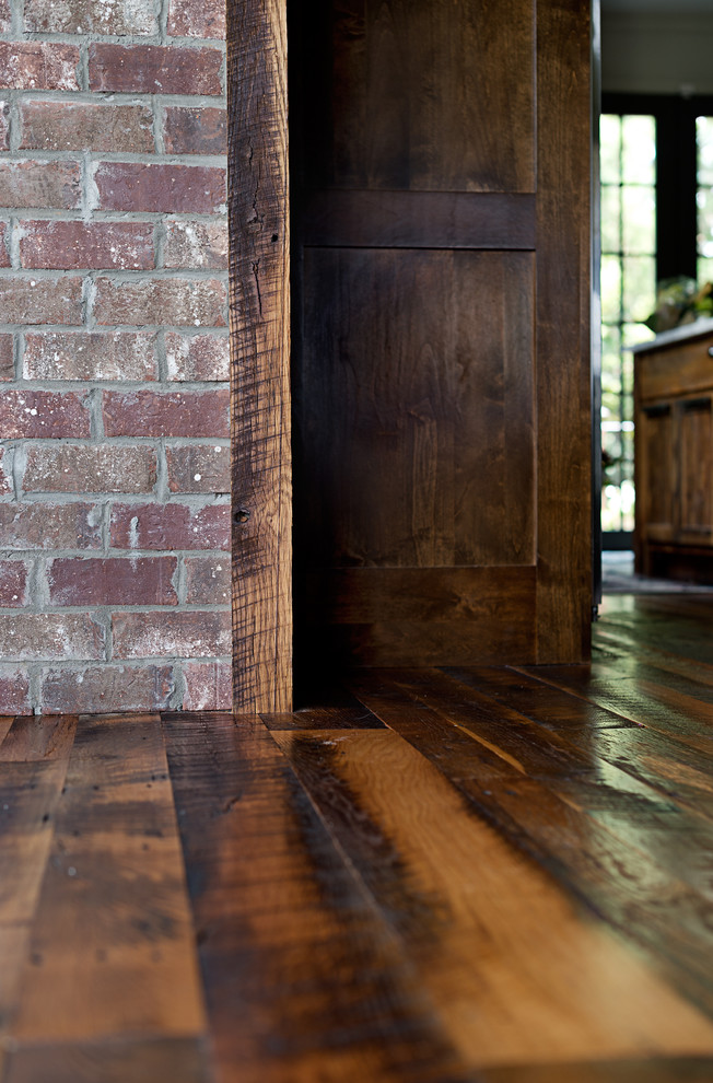 Example of a transitional hallway design in Other with white walls