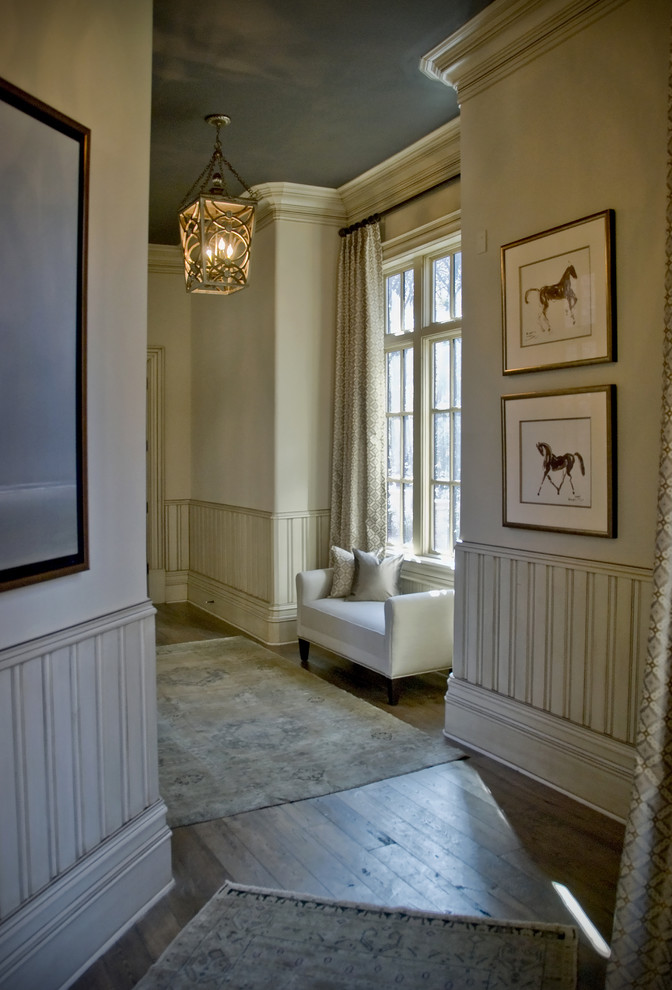 Hallway - transitional dark wood floor and brown floor hallway idea in Atlanta with beige walls
