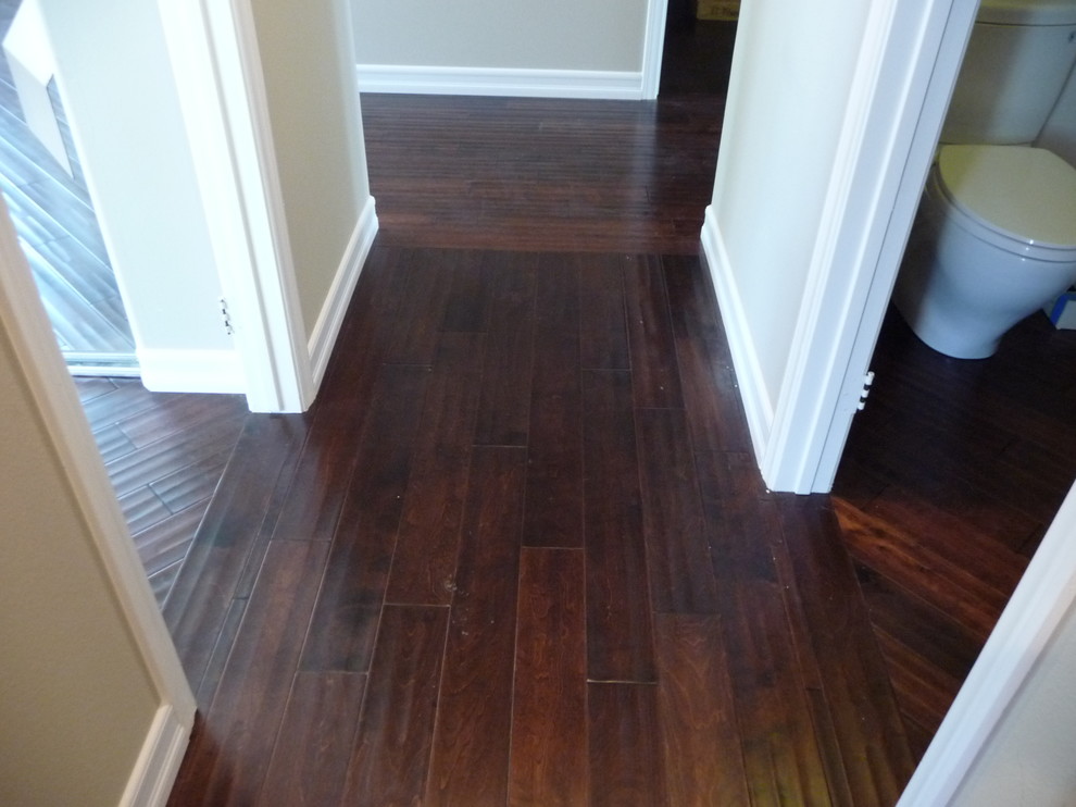 Hallway - contemporary medium tone wood floor hallway idea in San Diego