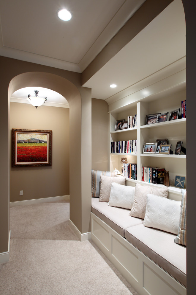Hallway - large traditional carpeted hallway idea in Grand Rapids with beige walls
