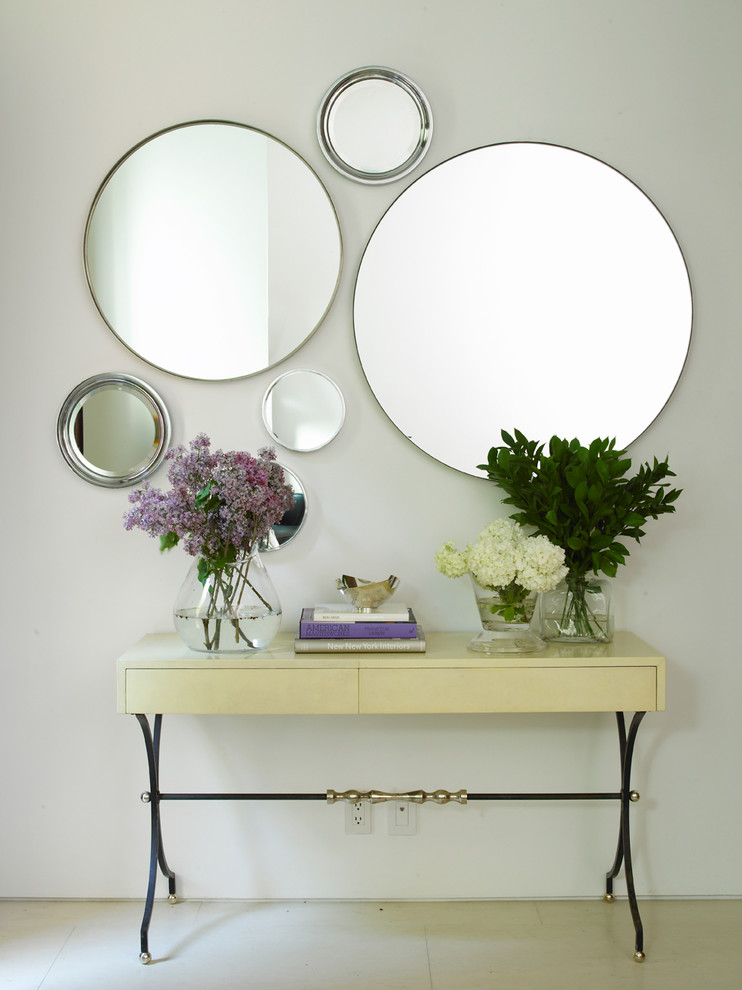 Inspiration for a contemporary hallway remodel in New York with white walls