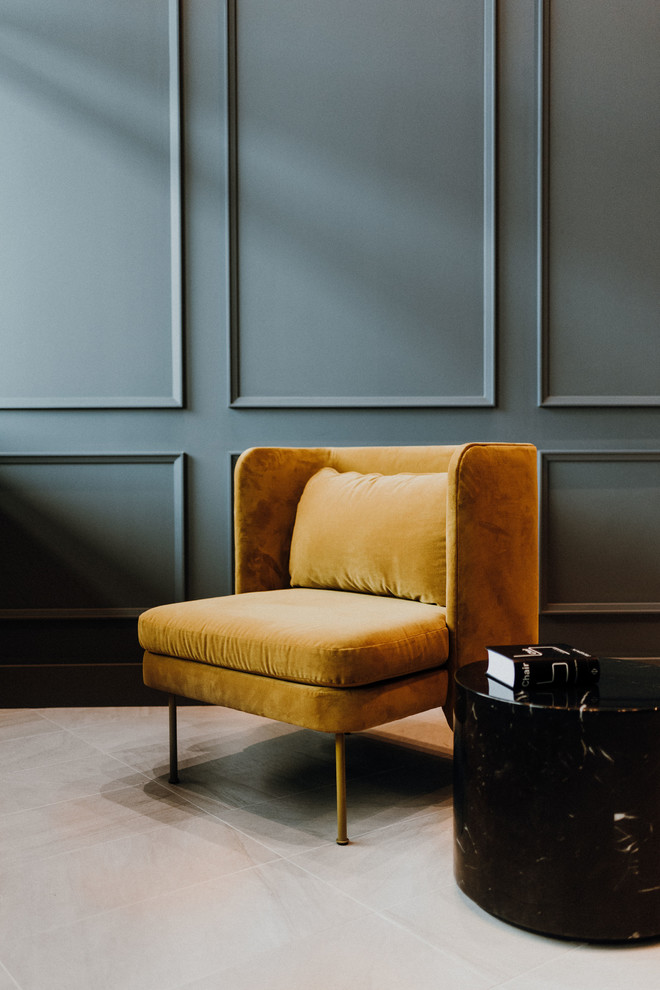 Inspiration for a timeless porcelain tile and beige floor hallway remodel in Cleveland with gray walls