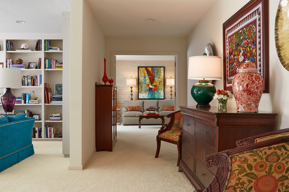 Example of a large eclectic carpeted and white floor hallway design in Minneapolis with beige walls