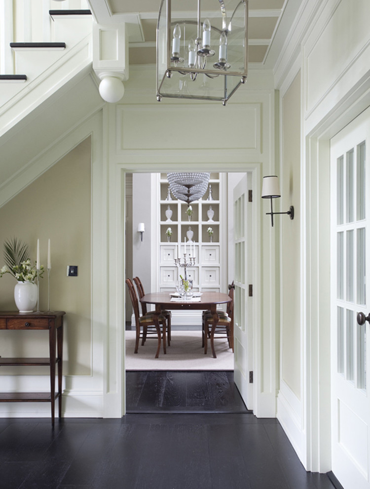 Inspiration for a timeless black floor hallway remodel in Dublin with beige walls