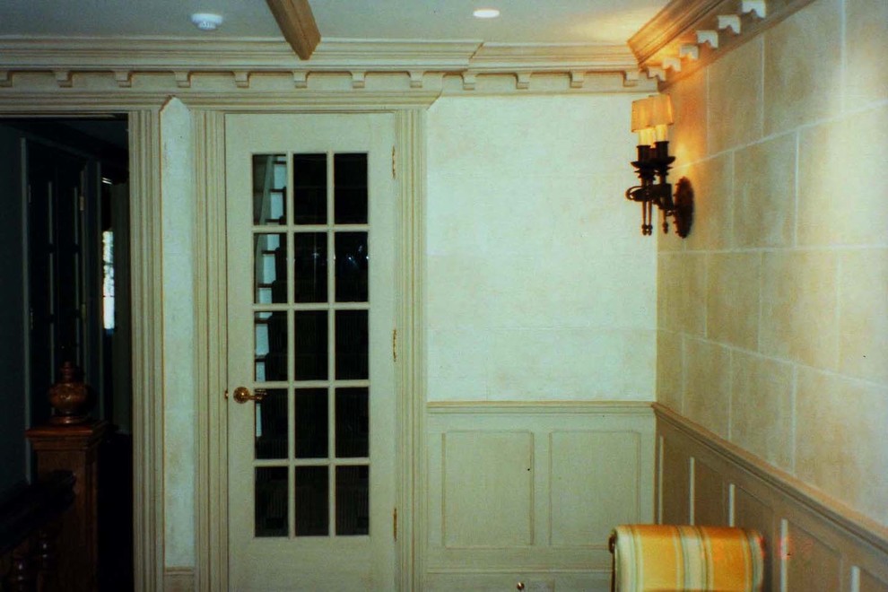 Large elegant dark wood floor and brown floor hallway photo in Boston with beige walls