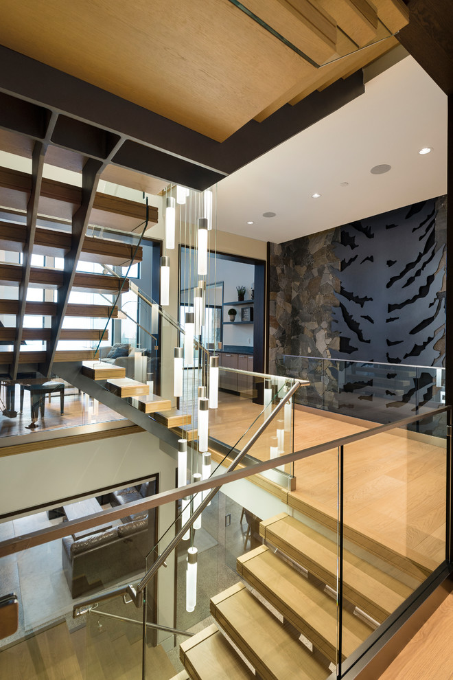 Design ideas for an expansive traditional staircase in Vancouver.