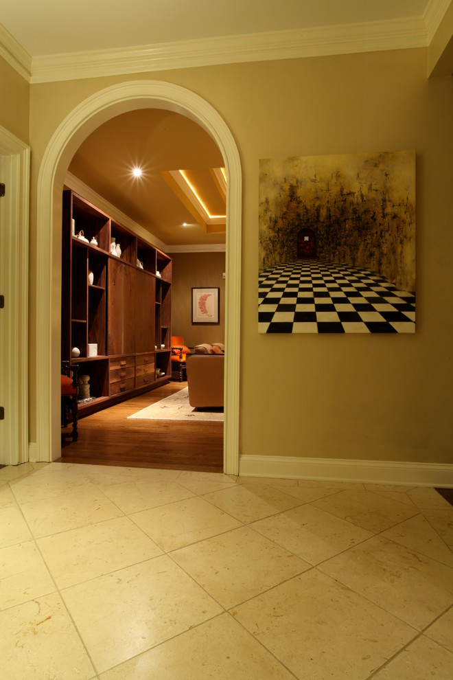 Example of a mid-sized minimalist ceramic tile hallway design in Atlanta with brown walls