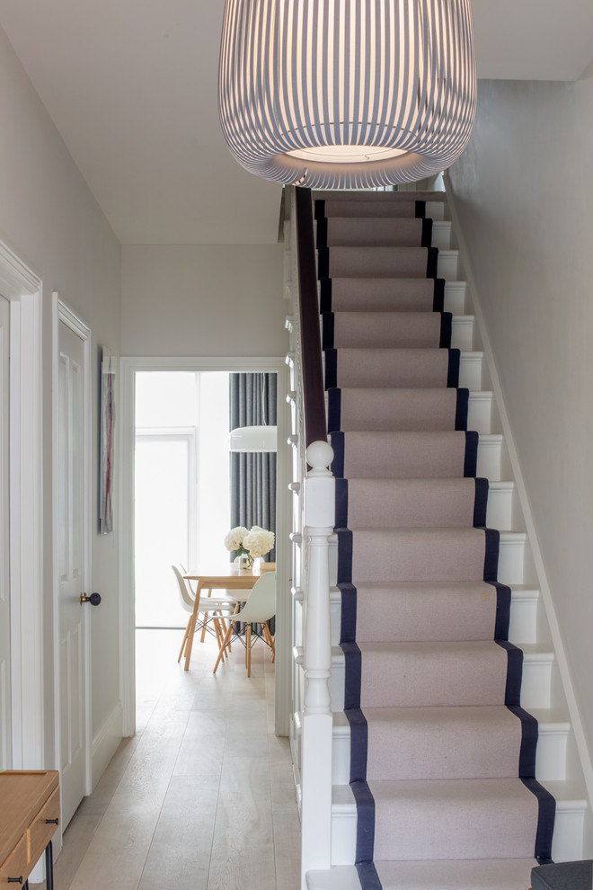 This is an example of a medium sized classic staircase in London.